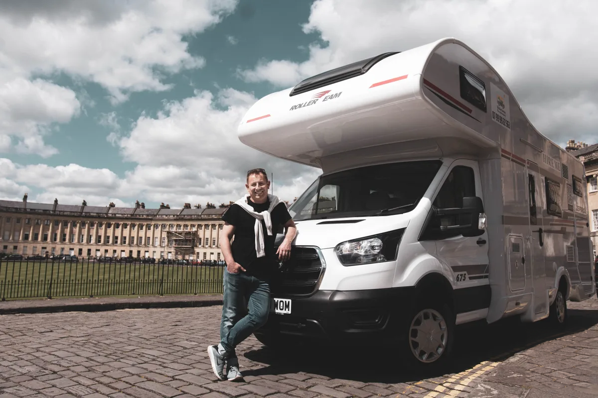A motorhome traveller beside a Roller Team motorhome, from the Motorhome Adventures collection